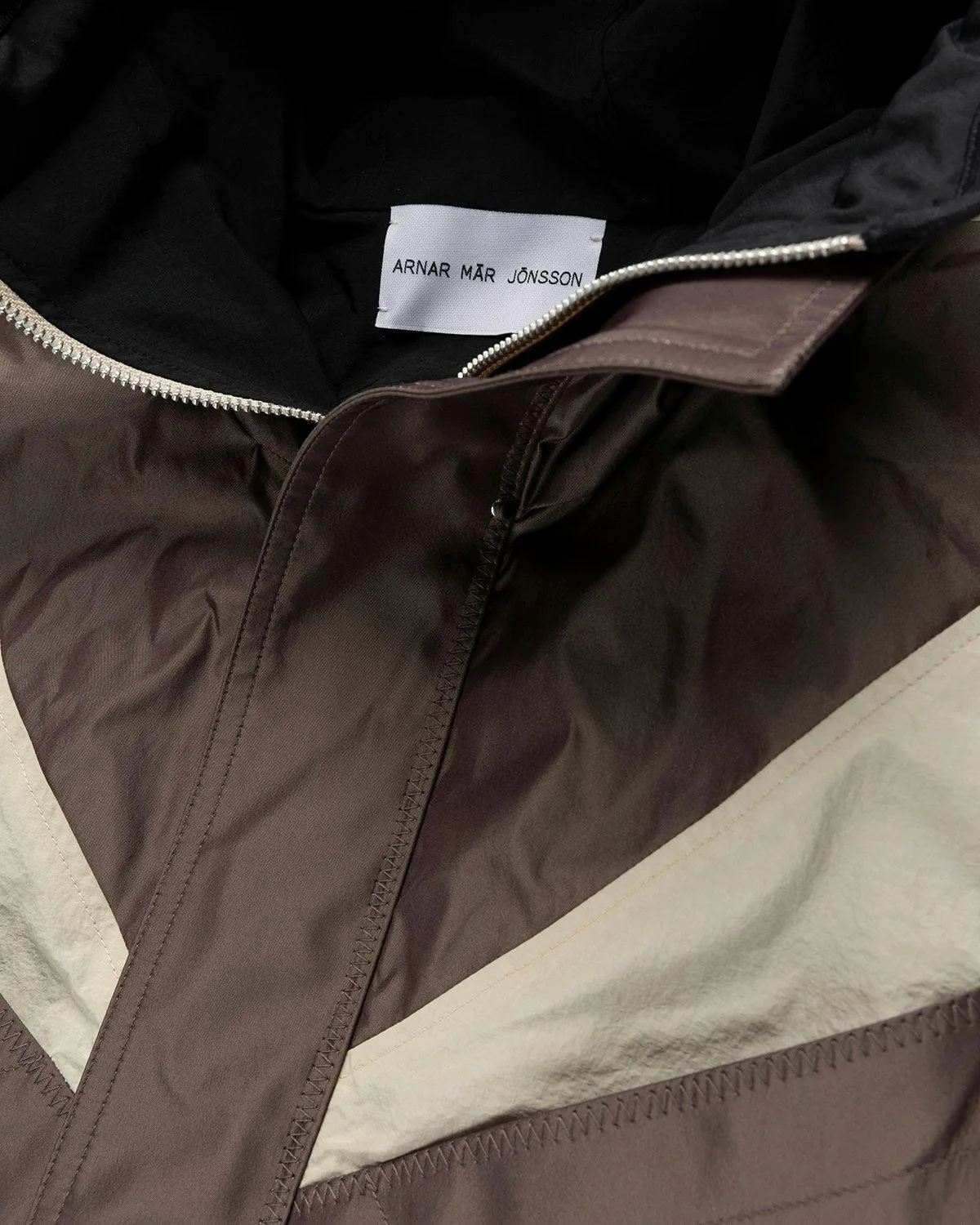 Arnar Mar Jonsson – Texlon Composition Outerwear Jacket Beige Chocolate Black | Highsnobiety Shop