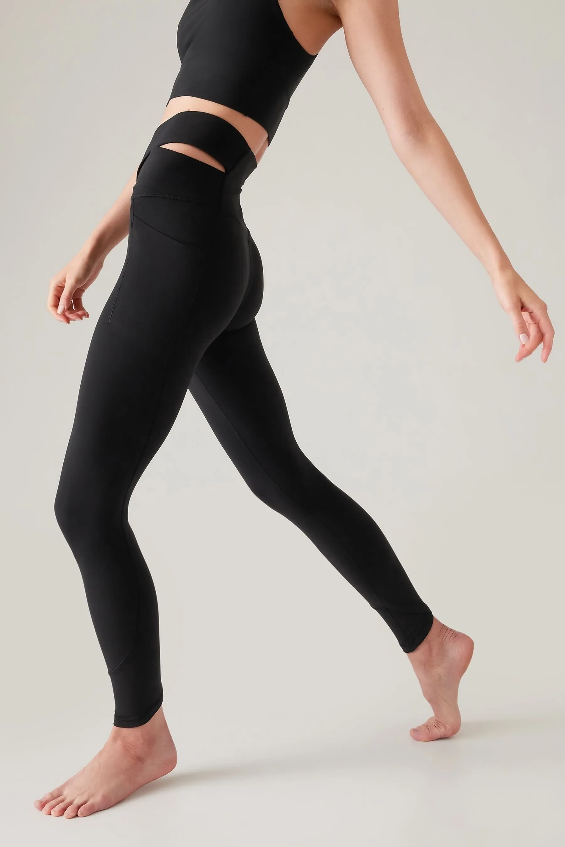 Athleta Black Salutation Stash Wrap Leggings