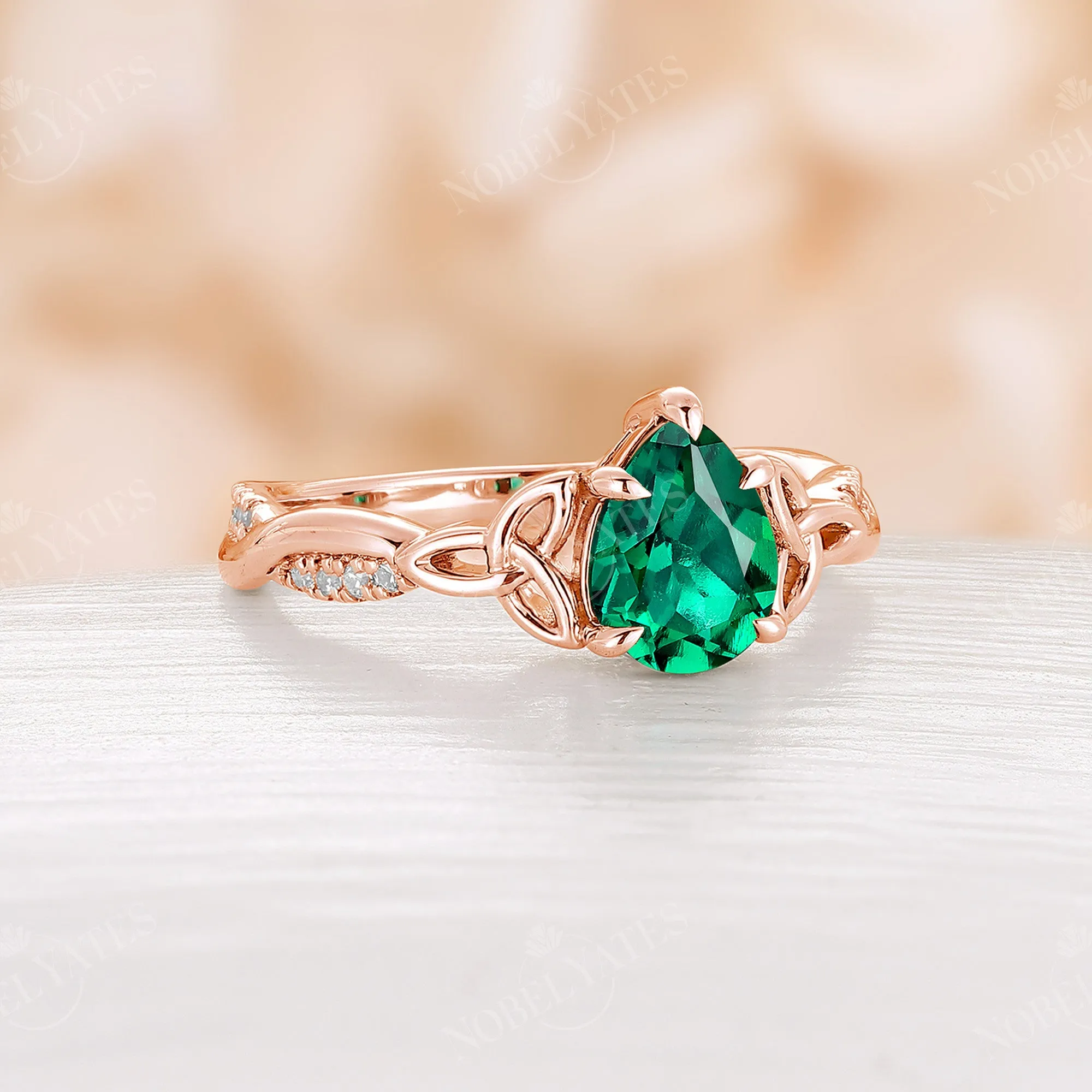 Pear Lab Emerald Claw Prong Celtic Twist Engagement Ring