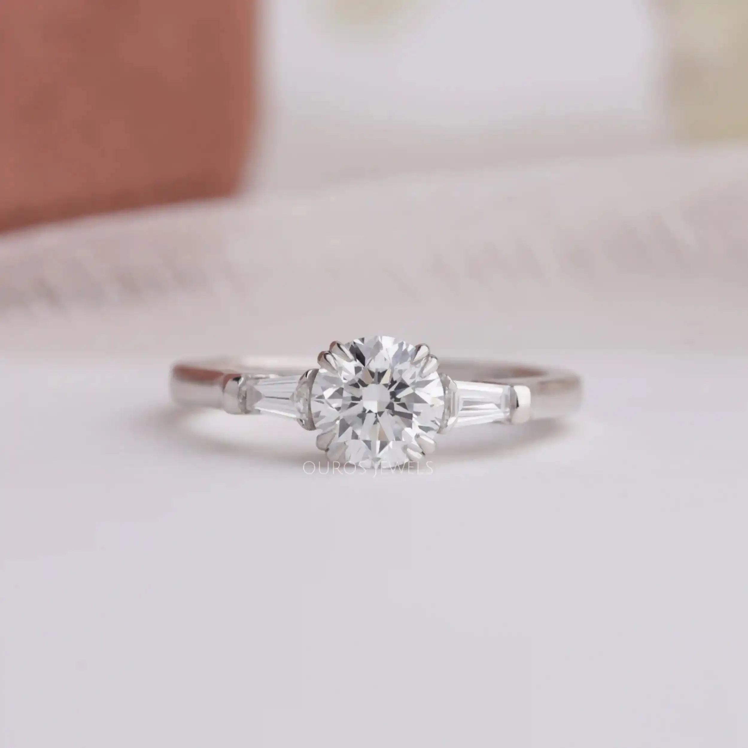 Round and Tapered Baguette Cut Three Stone Engagement Ring